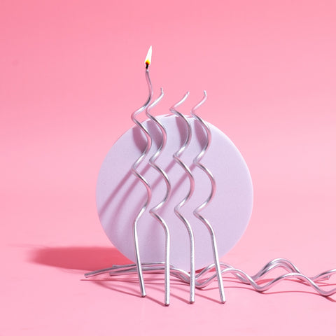 SILVER SWIRLY CANDLES 16pk