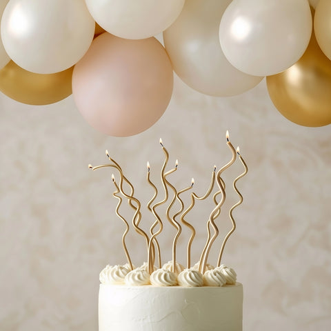 GOLD SWIRLY CANDLES 16pk
