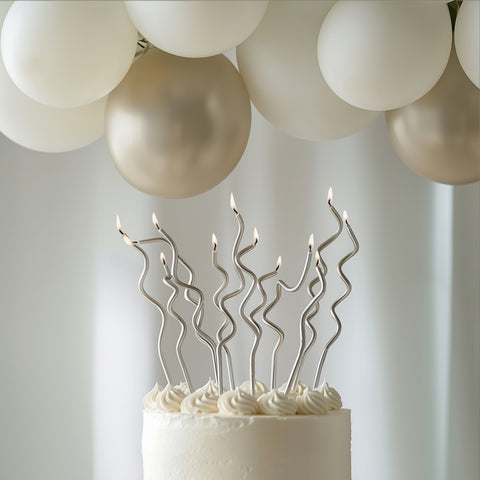 SILVER SWIRLY CANDLES 16pk
